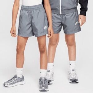 Nike sportswear club big kids 4.5” woven shorts. Youth size large.